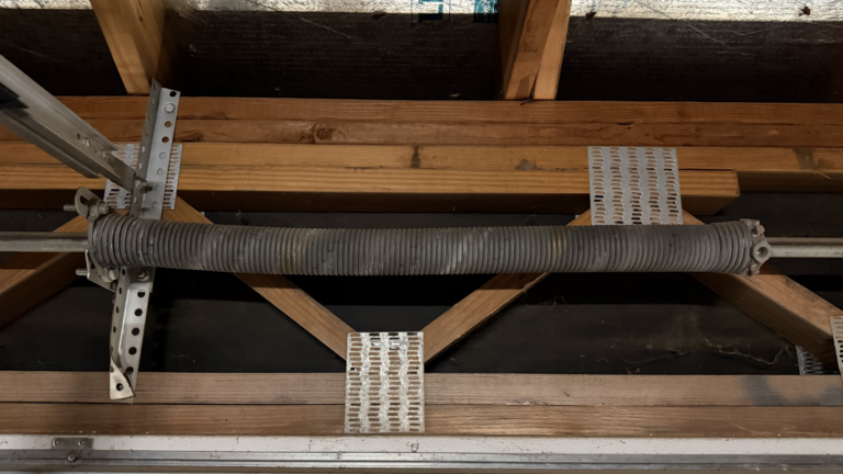The 400-Pound Guillotine: Why Your Houston Home’s Garage Door is a Ticking Time Bomb