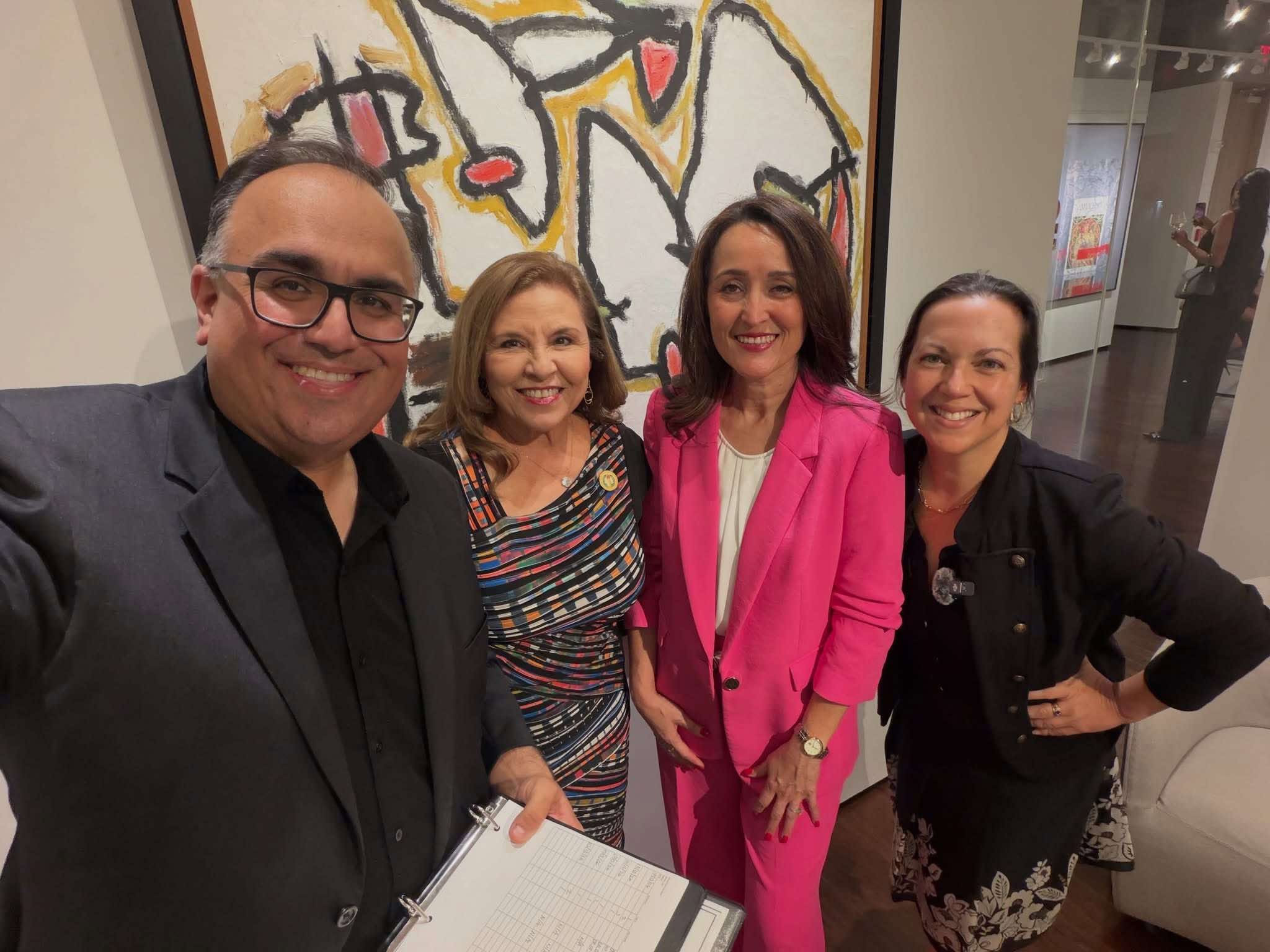 Mike Acosta, Dori Contreras and Veronica Rivas Molloy with another guest at the Arrival Awards kickoff.