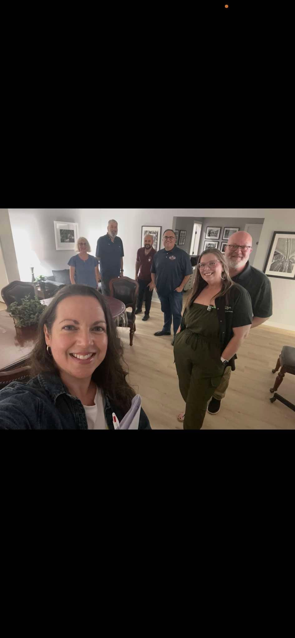 Community Connectors smiling together during a studio gathering